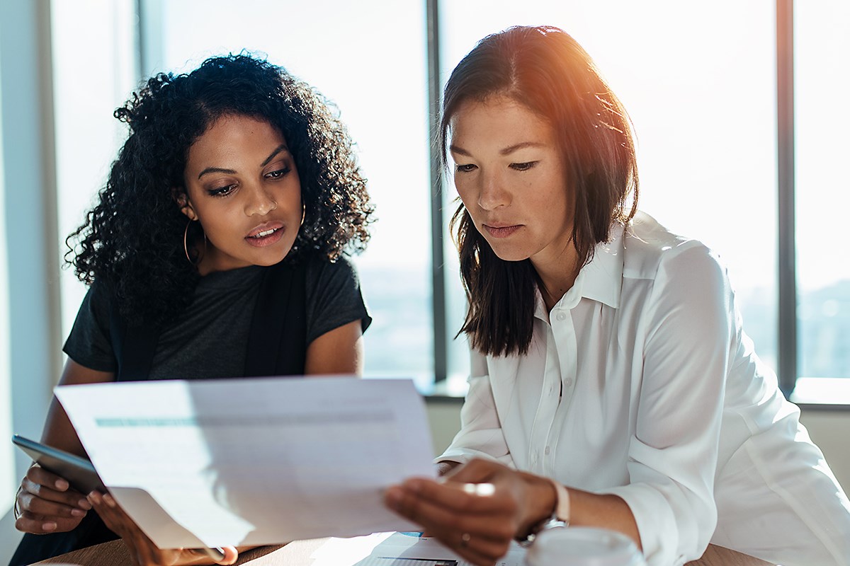 Two women collaborating