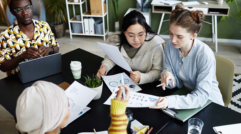 diverse team works together