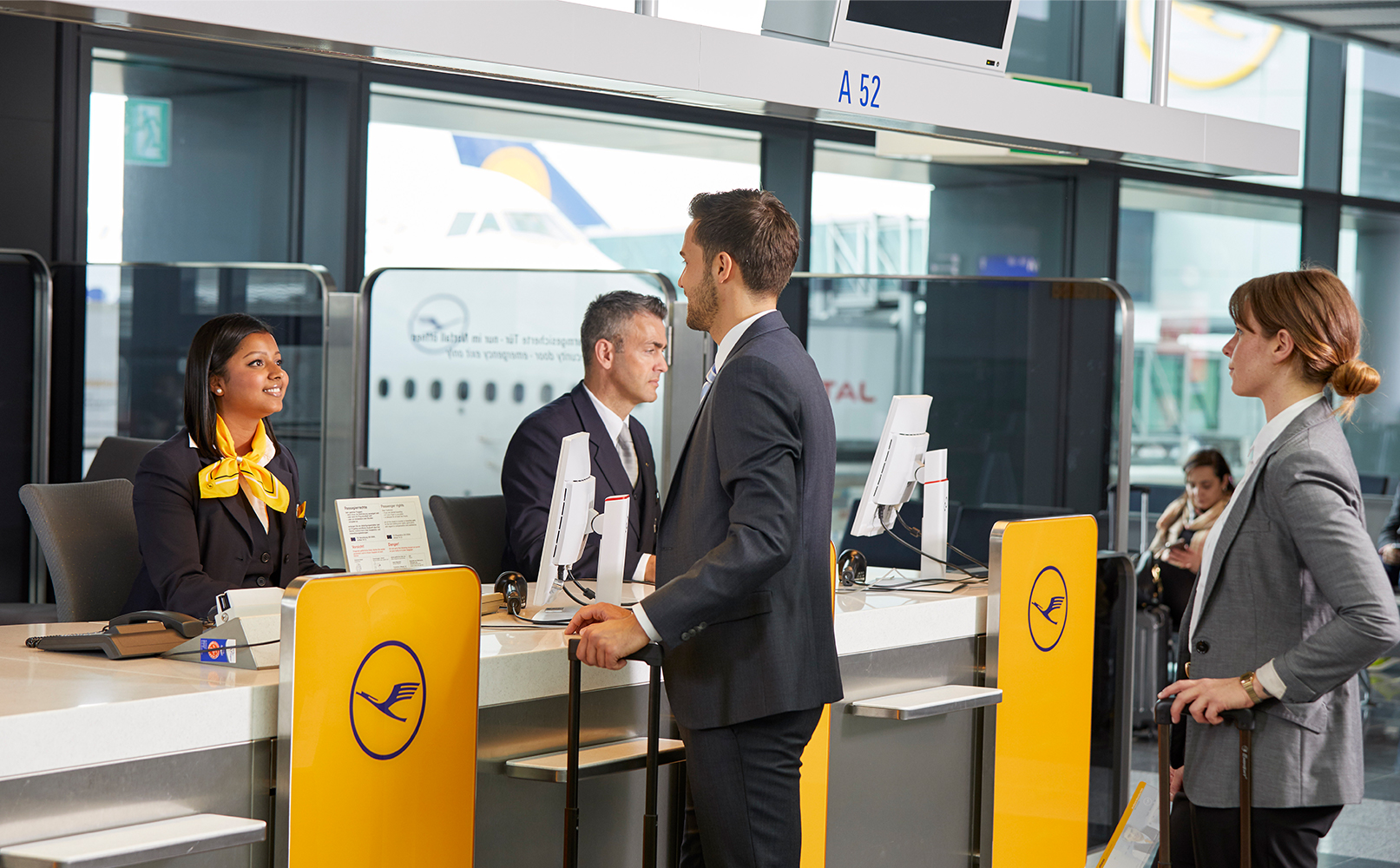 guests at Lufthansa airlines desk