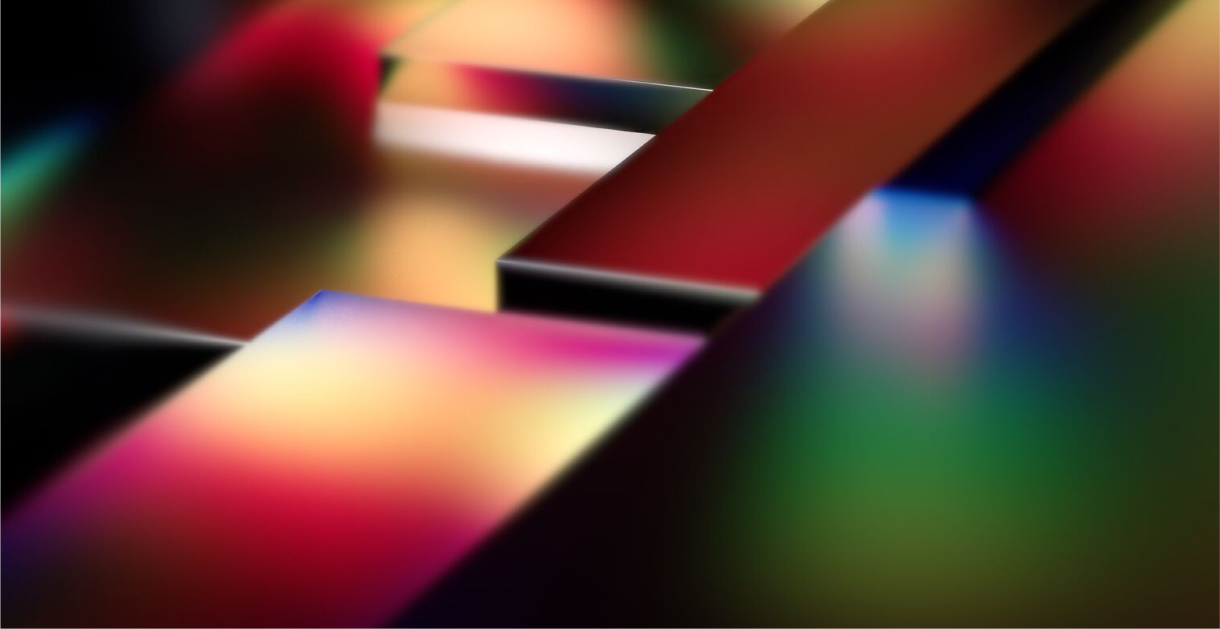 An abstract image featuring vibrant, multicolored 3D blocks with smooth surfaces and blurred edges. The colors blend seamlessly, creating a futuristic and dynamic composition. The blocks are arranged at varying angles, giving the image a sense of depth and movement. The design conveys innovation, creativity, and modernity, evoking themes of technology and digital transformation.